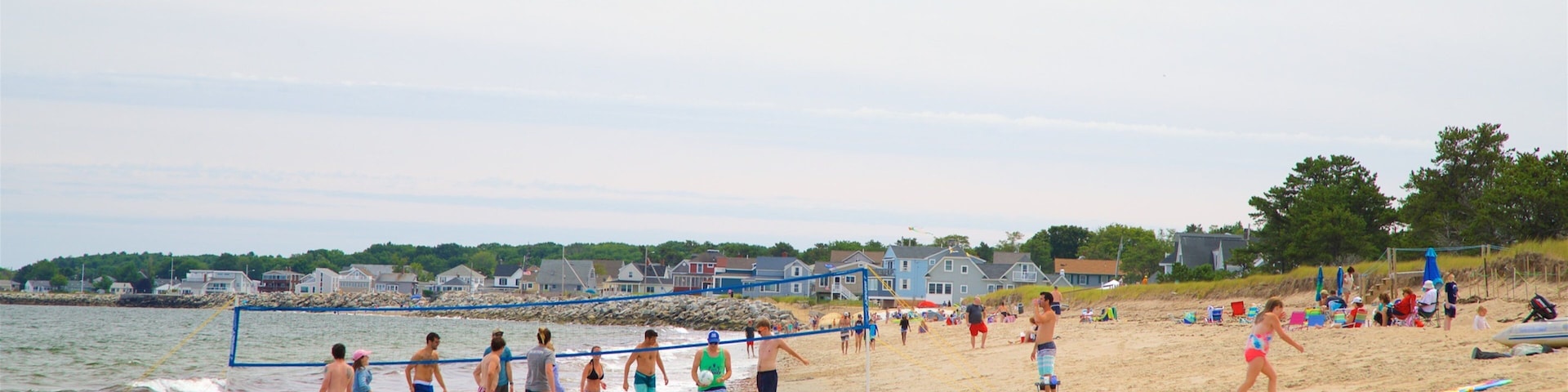 Ferry Beach State Park which includes a beach, general coastal views and a coastal town
