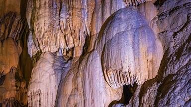A cave with stalactites and stalagmites.