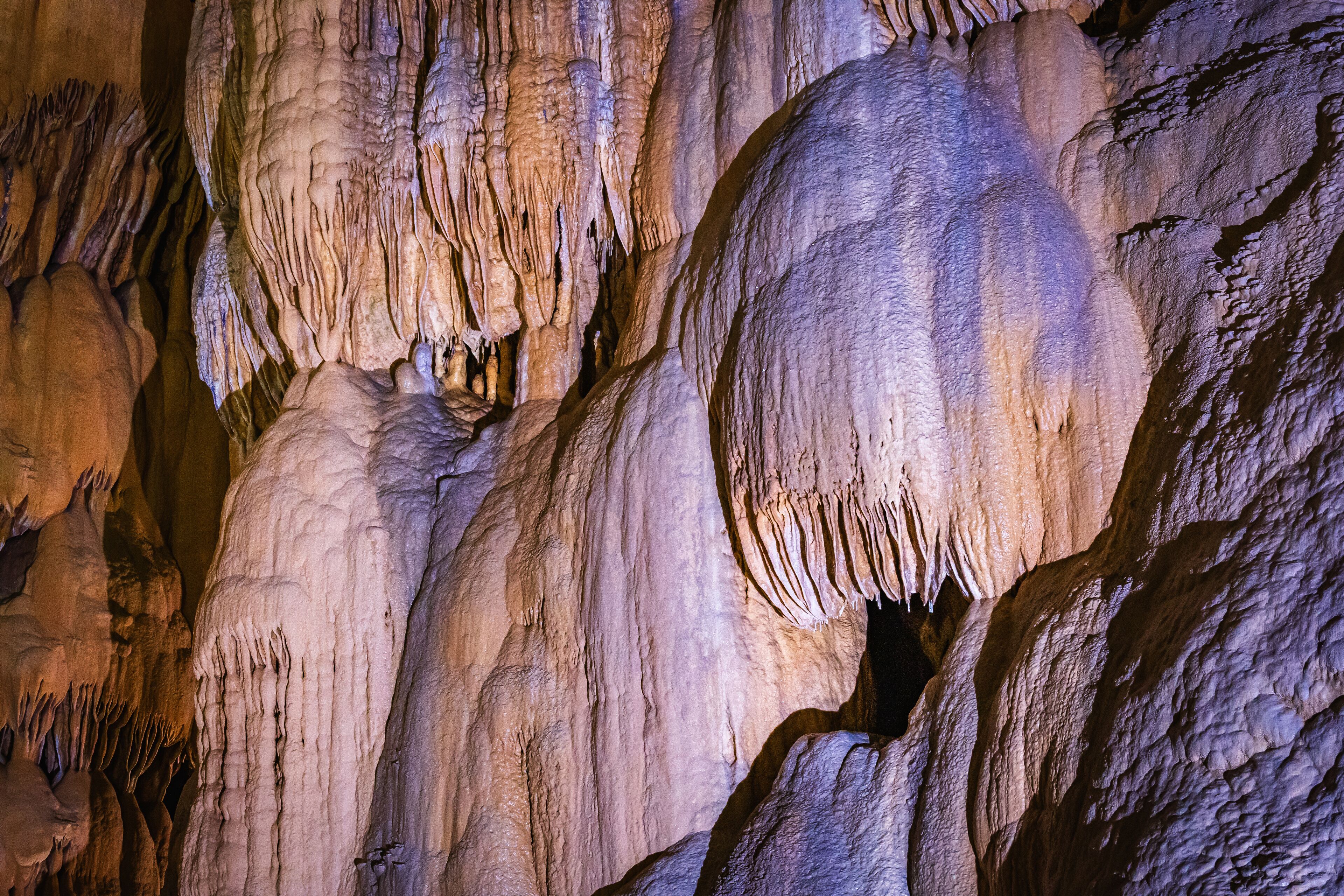 A cave with stalactites and stalagmites.
