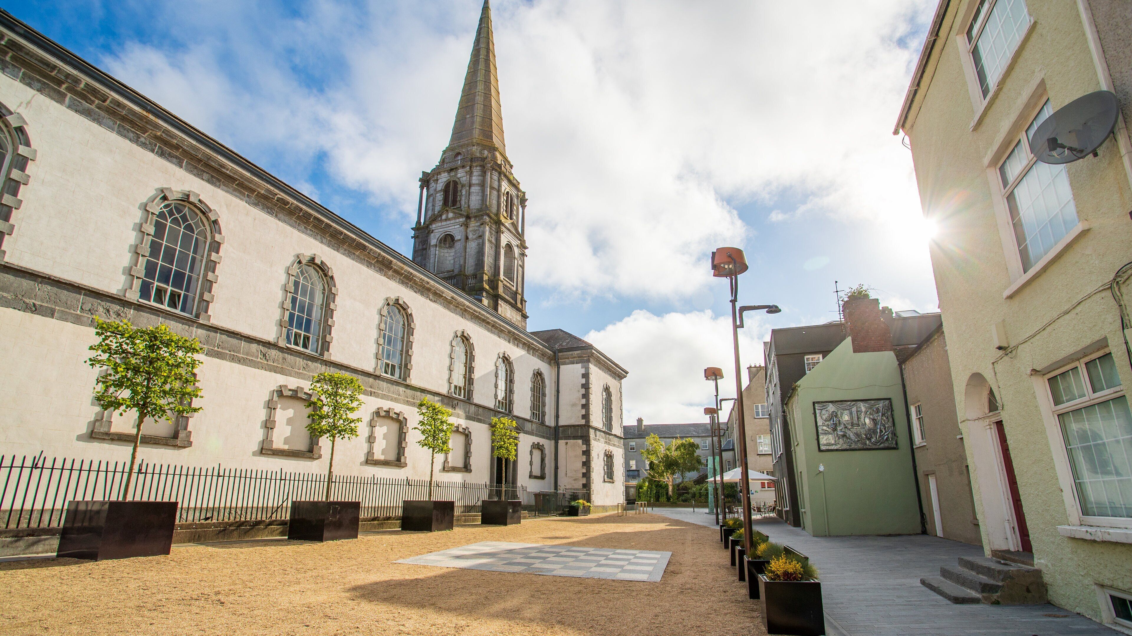 Viking Triangle featuring heritage architecture and a sunset
