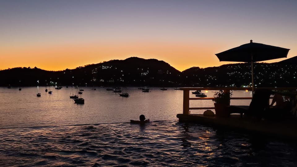 Serene Sunset
The golden glow of the setting sun highlights the many sail boats in Zihuatanejo Bay. Thus week is Zihua Sailfest, where the boats come once a year and offer sail and music cruises for donations to local schools. Last night was the Sail Parade to Ixtapa and back, this week Music and Sunset cruises.
All proceeds go to the schools and they hope to beat last years $7,000 donation.