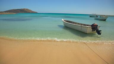 Nacula Island showing boating, landscape views and a sandy beach
