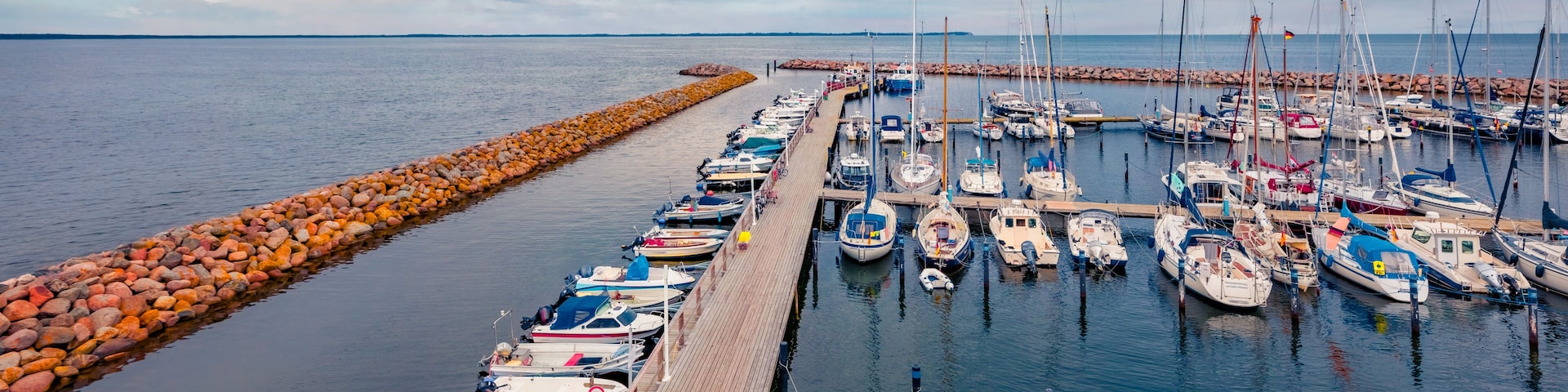 Wonderful summer view of Glowe port, municipality in the Vorpommern-Rugen district, in Mecklenburg-Vorpommern, Germany, Europe. Traveling concept background..