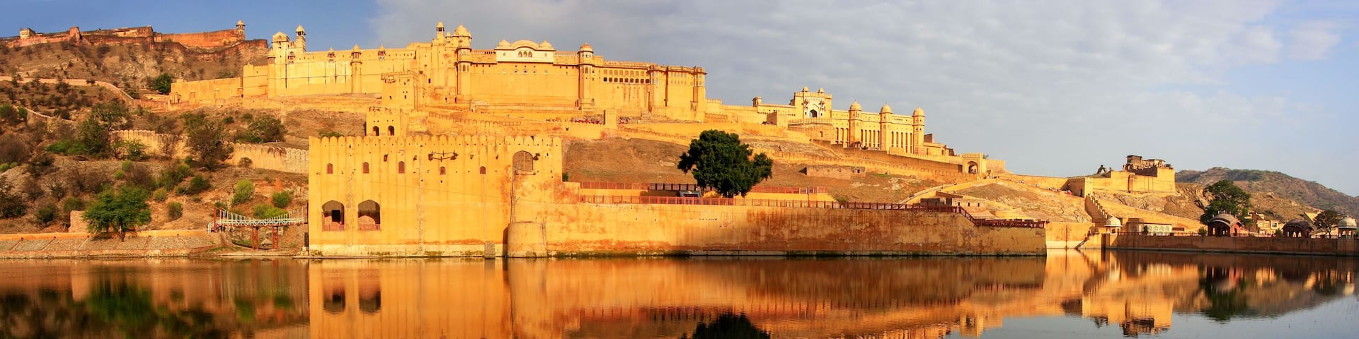 Panorama of Amber Fort reflected in Maota Lake near Jaipur, Raja
