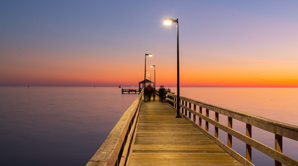 Biloxi Beach showing a sunset and general coastal views