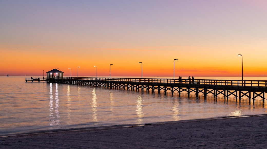 Biloxi Beach showing a sunset and general coastal views