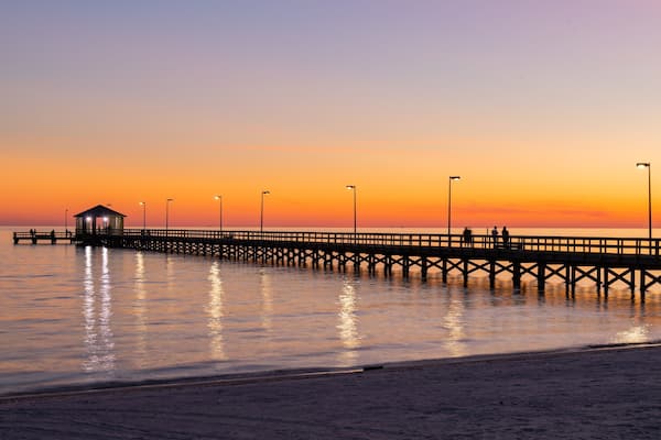 Biloxi Beach showing a sunset and general coastal views