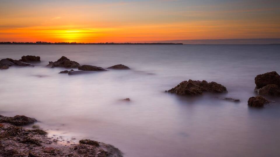 Sunset along Sanibel Causeway. #beachtips