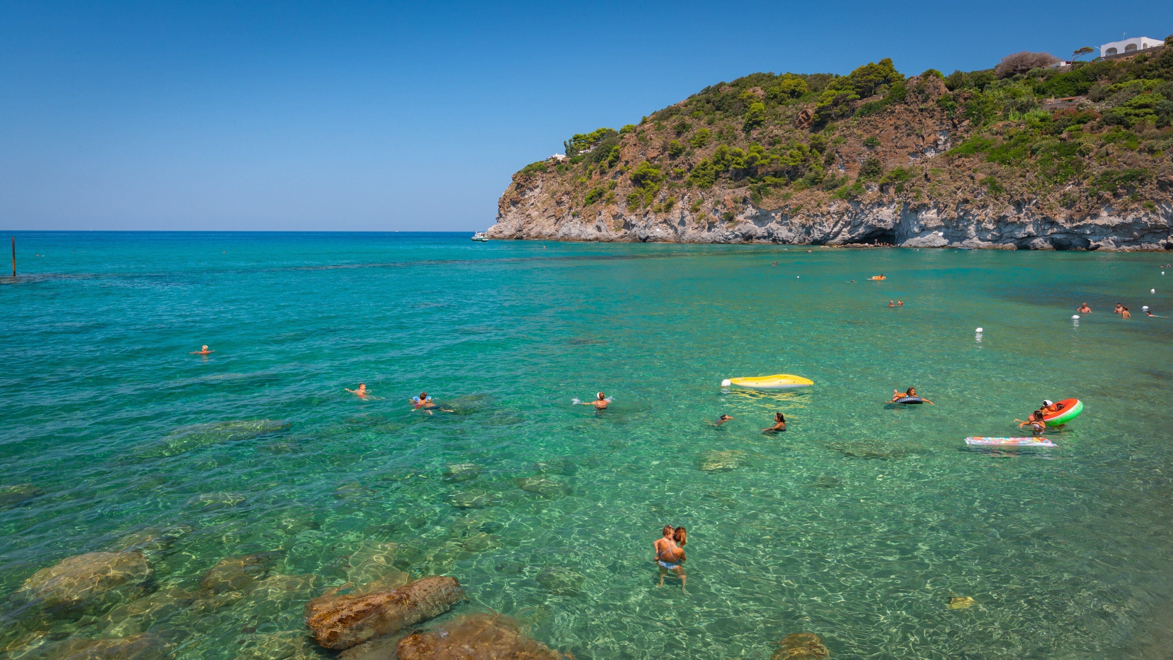 San Francesco Beach which includes swimming, general coastal views and tropical scenes
