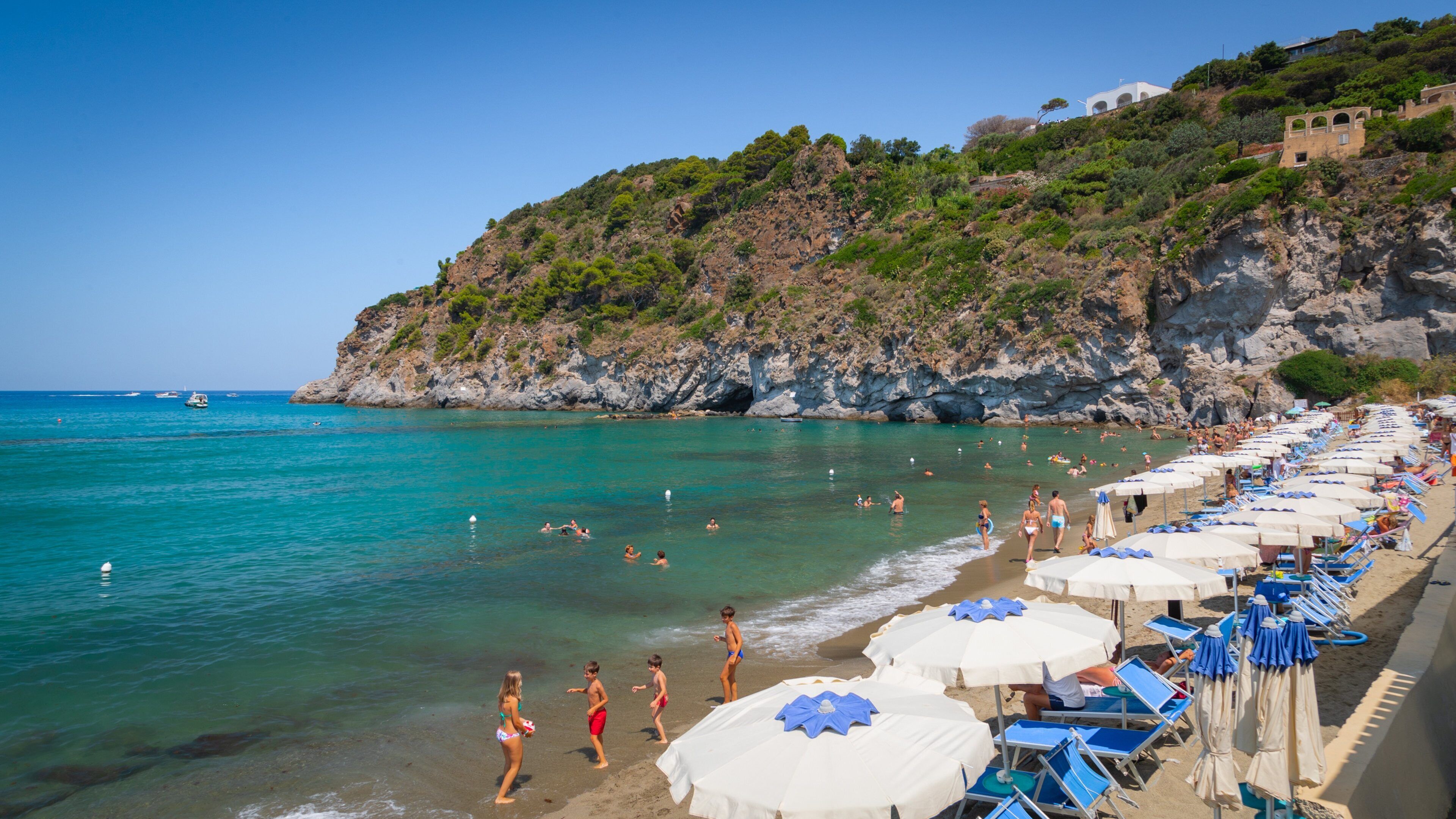 San Francesco Beach featuring swimming, general coastal views and rugged coastline