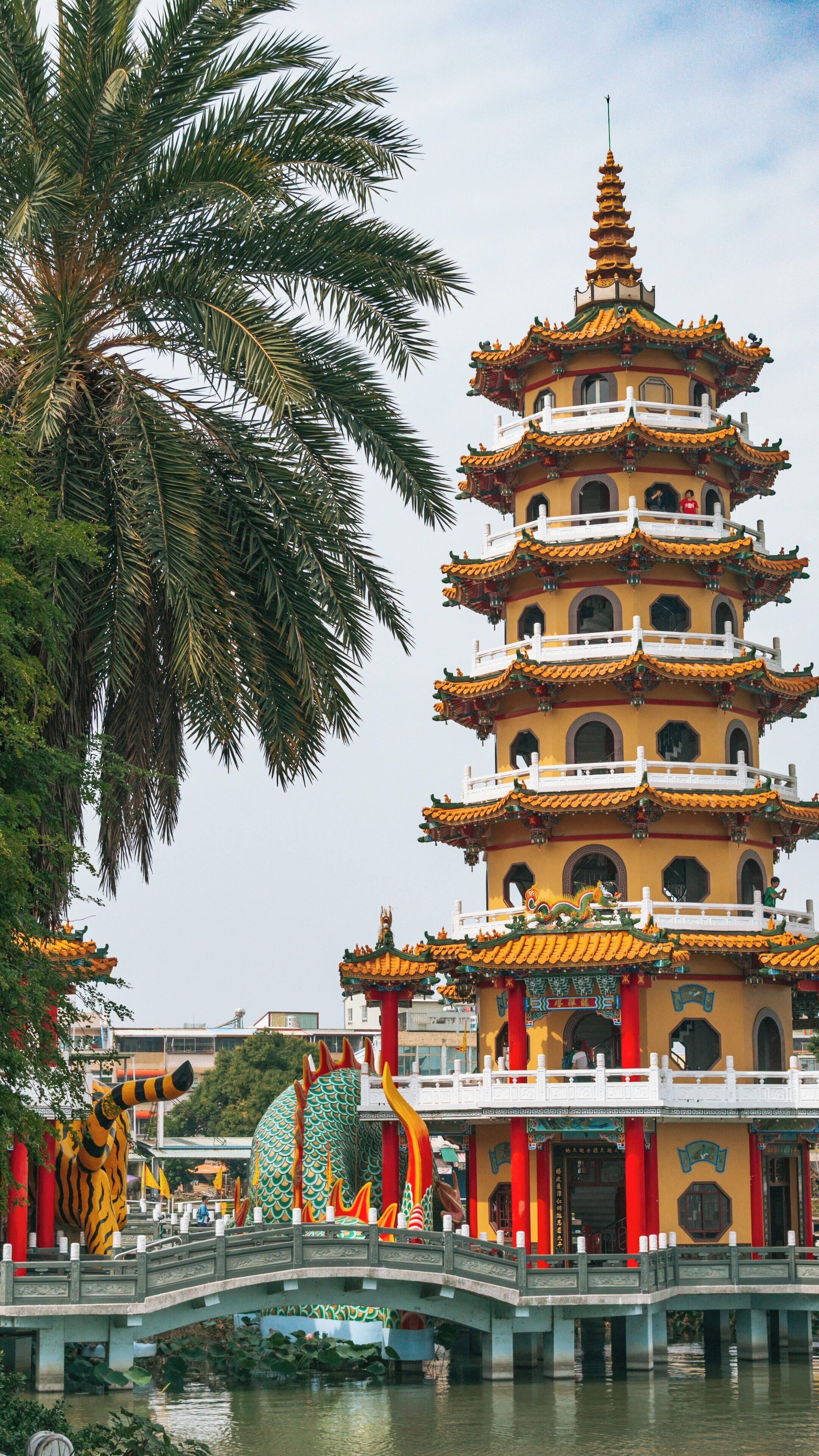 Explore the majestic Dragon Tiger Tower in Zuoying District, Kaohsiung, Taiwan, a remarkable cultural landmark surrounded by lush greenery