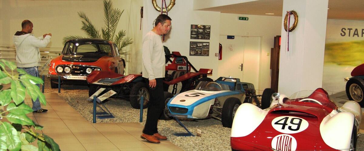 Vintage race cars in a museum.