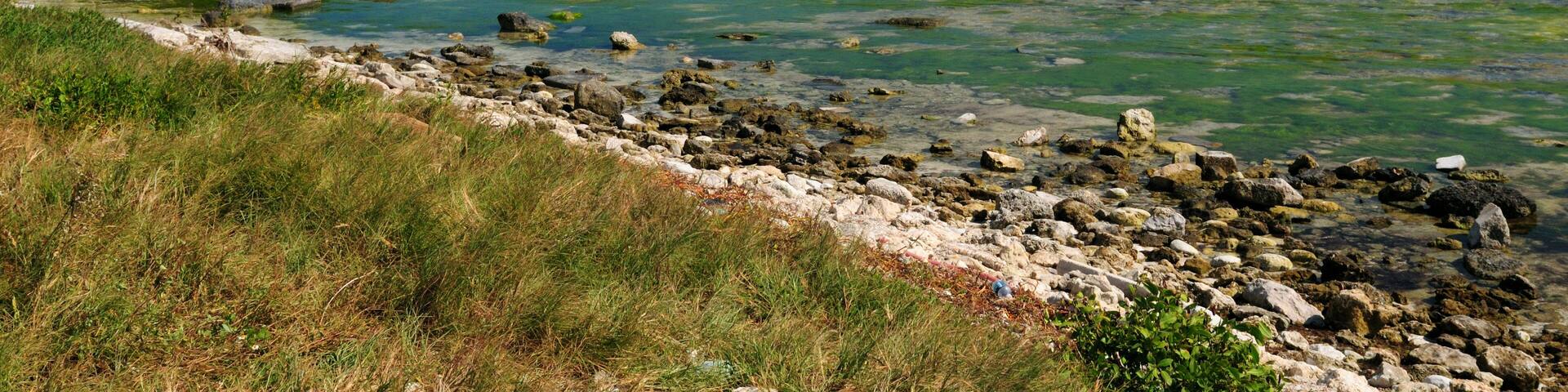 View To Old Bahia Honda Bridge, Part Of The Florida Keys Overseas Heritage Trails, From West Summerland Key On A Sunny Autumn Day With A Clear Blue Sky And A Few Clouds