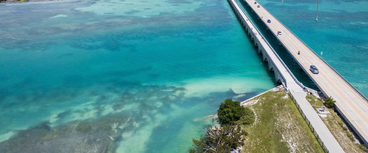 Aerial view of road to Key West with turquoise water and small island, Summerland Key, Florida, United States.