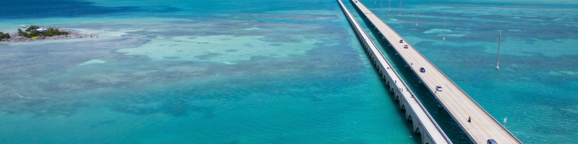 Aerial view of road to Key West with turquoise water and small island, Summerland Key, Florida, United States.