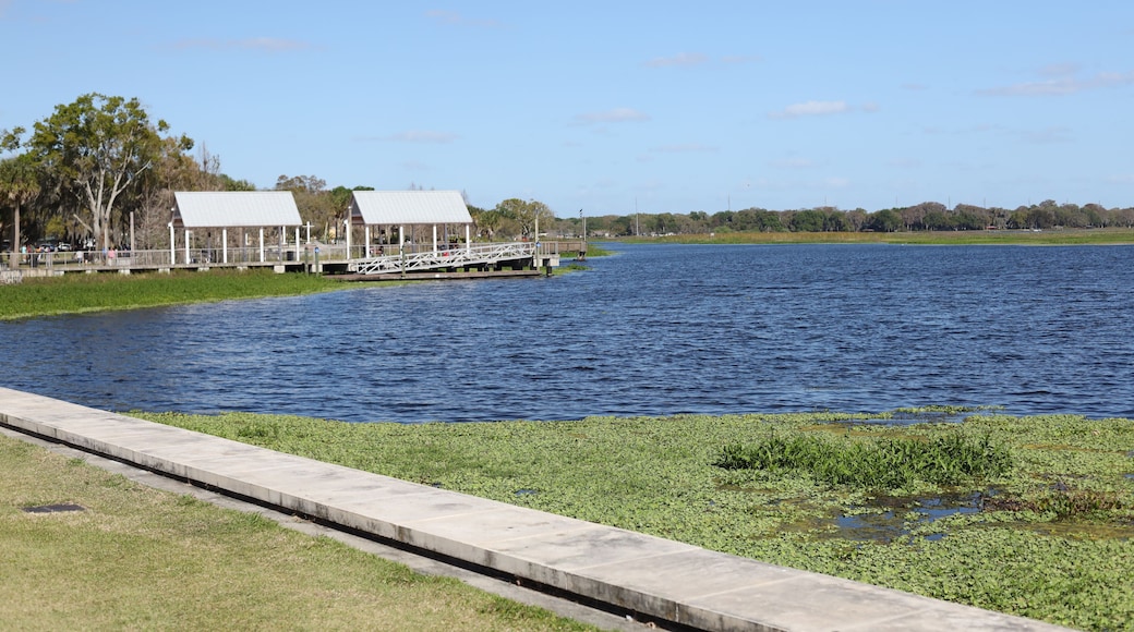 Kissimmee Lakefront Park Grassy waterfront park with walking paths, a fishing pier, picnic pavilions, and a shaded playground. children's playgrounds, splash pad