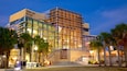 A modern building with a sign reading "Tampa Bay History Center".