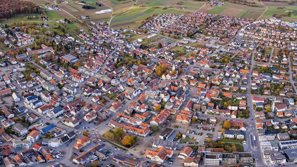 Aerial view of the old town of the city Laichingen
in Germany on a sunny afternoon in autumn