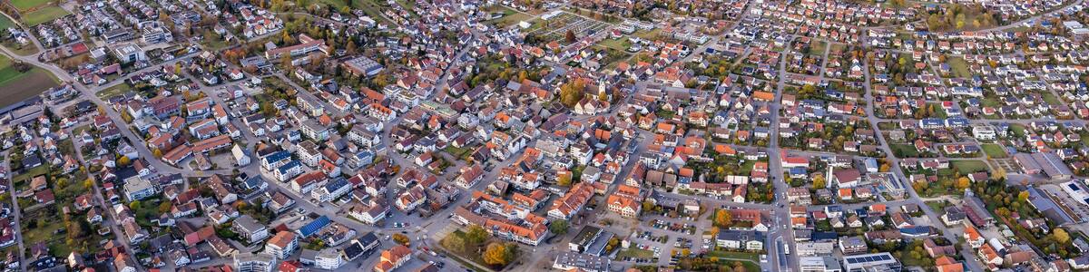 Aerial view of the old town of the city Laichingen
in Germany on a sunny afternoon in autumn
