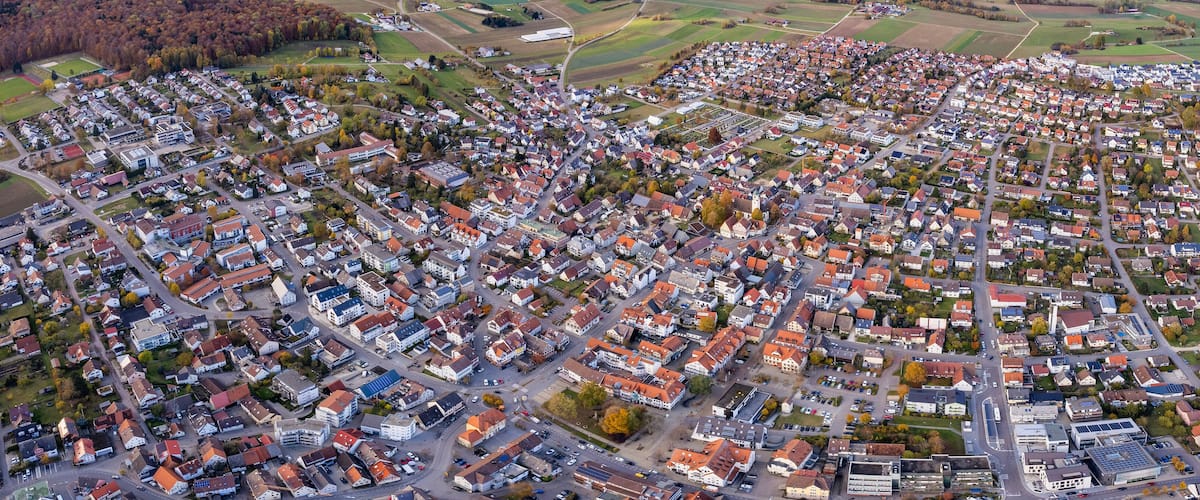 Aerial view of the old town of the city Laichingen
in Germany on a sunny afternoon in autumn