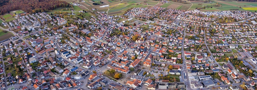 Aerial view of the old town of the city Laichingen
in Germany on a sunny afternoon in autumn