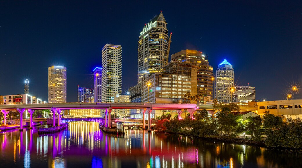 Tampa Downtown Skyline at Night with Bright Reflections on Hillsborough River