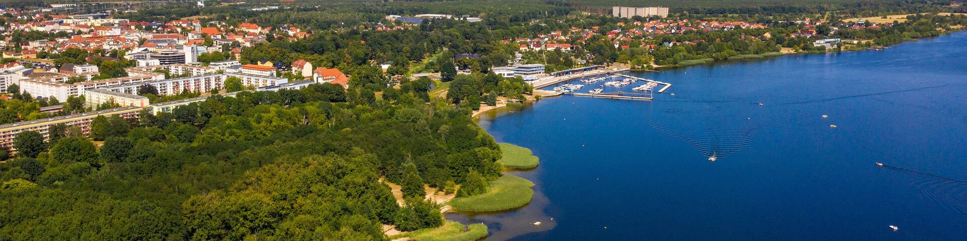 Beauty of nature in heights. aerial drone of Senftenberg lake, green forests. Senftenberg Lake Brandenburg Germany.
