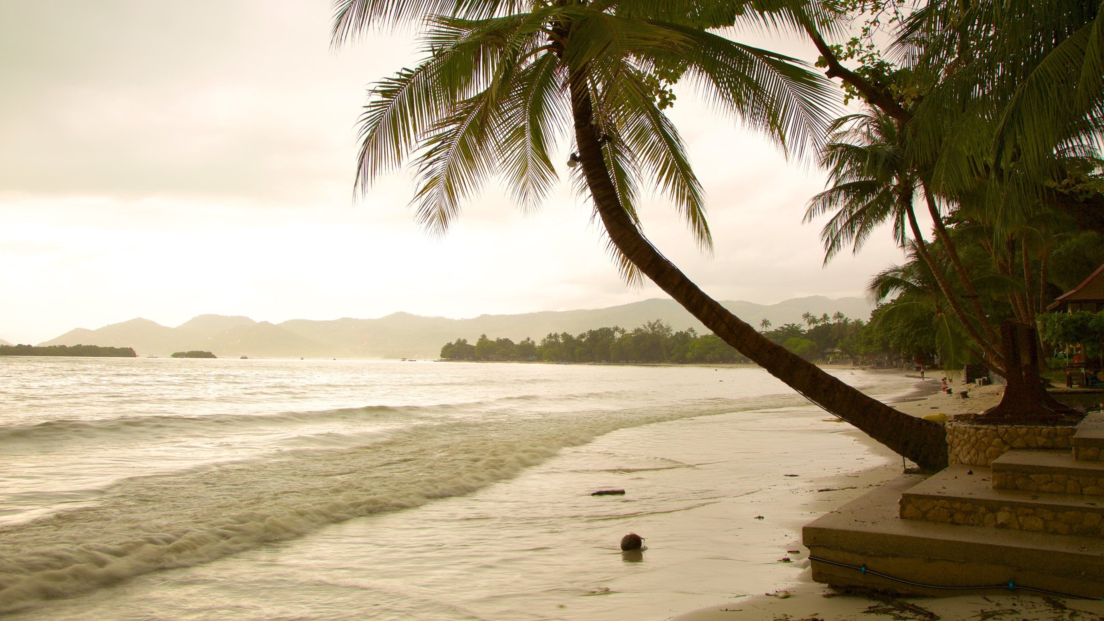Chaweng Noi Beach featuring a sunset and a sandy beach