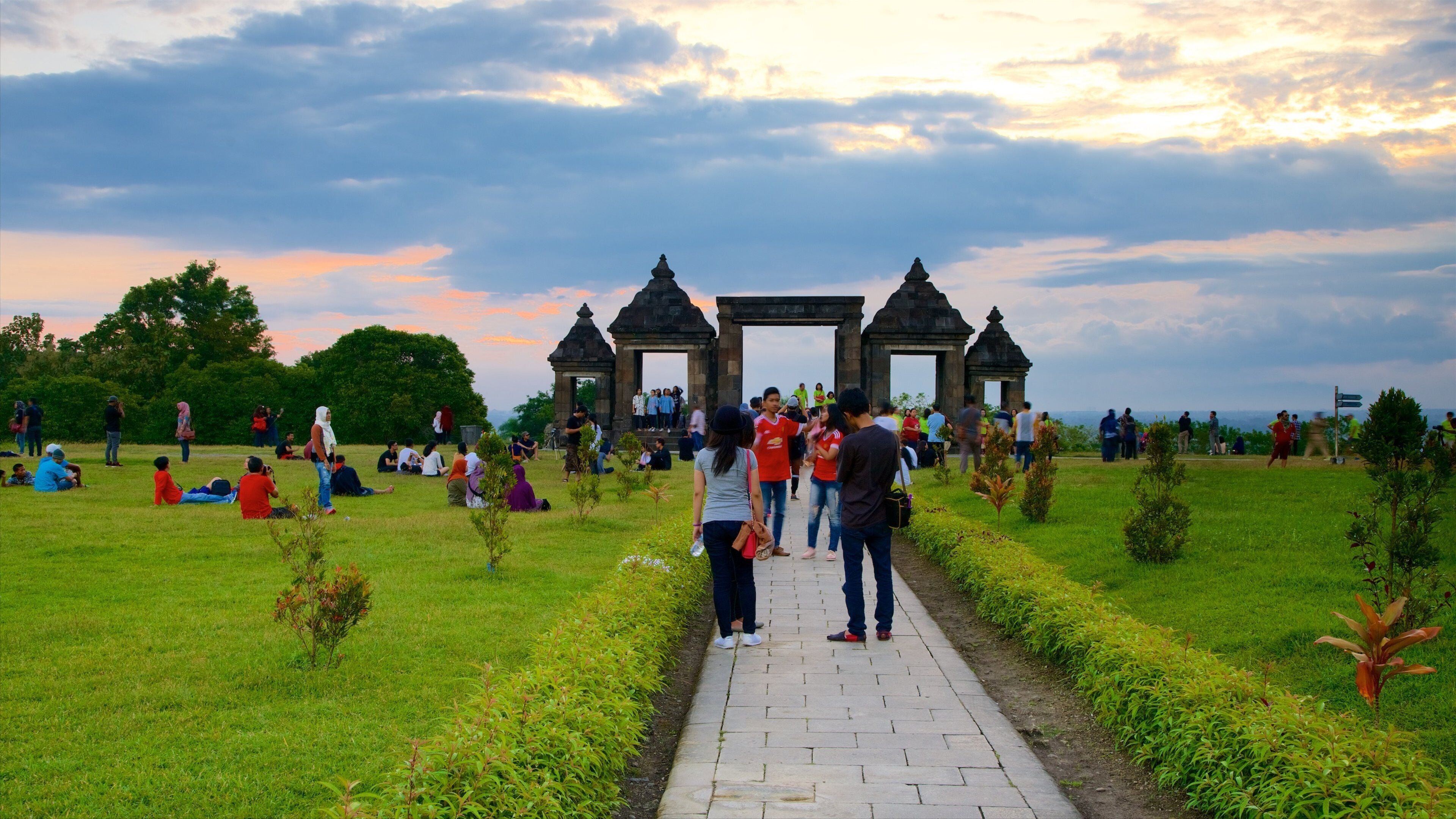 Ratu Boko Palace which includes heritage elements and a garden as well as a small group of people