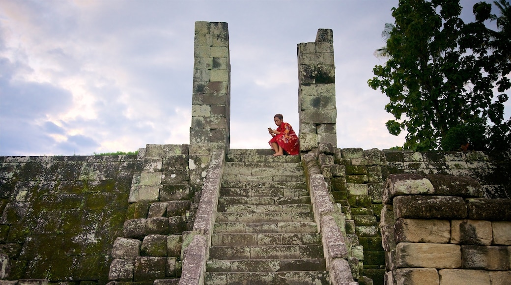 Ratu Boko Palace featuring heritage elements as well as an individual femail