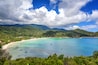 Beautiful tropical beach with blue water and green hills, top view. Koh Phangan, Thailand, Ao Thong Nai Pan Noi