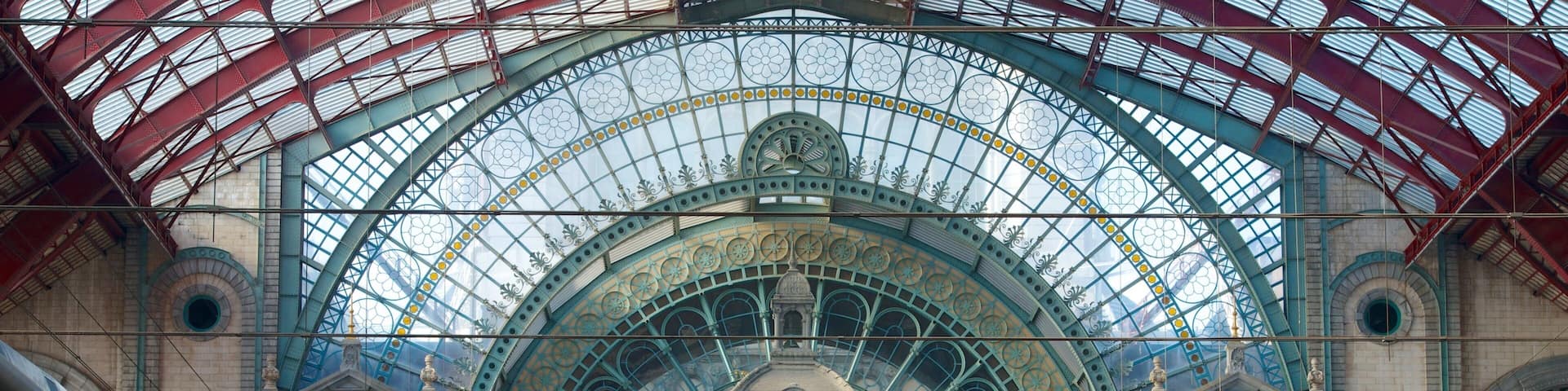 Antwerp Central Station showing interior views, railway items and heritage architecture