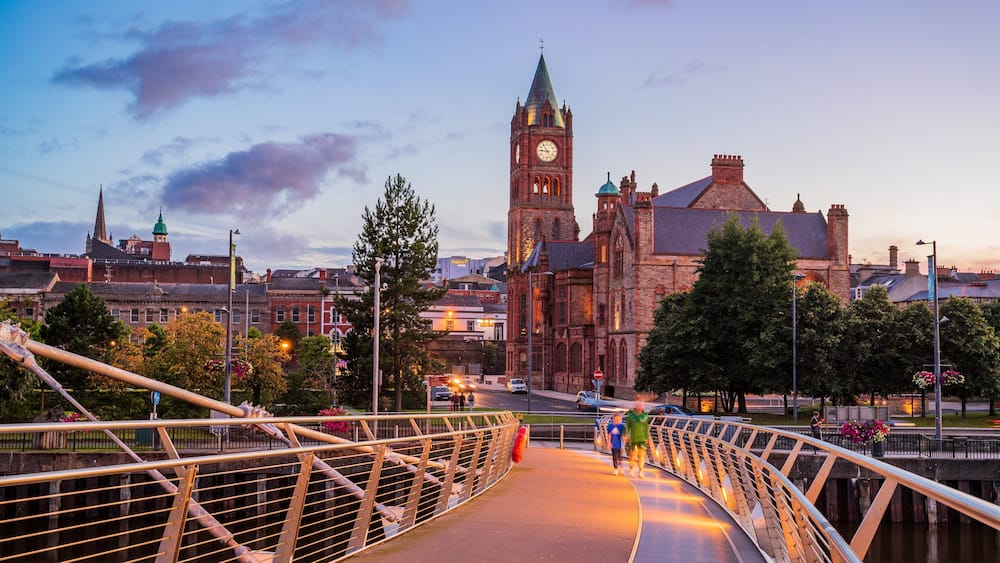 Peace Bridge which includes a sunset, a bridge and heritage architecture