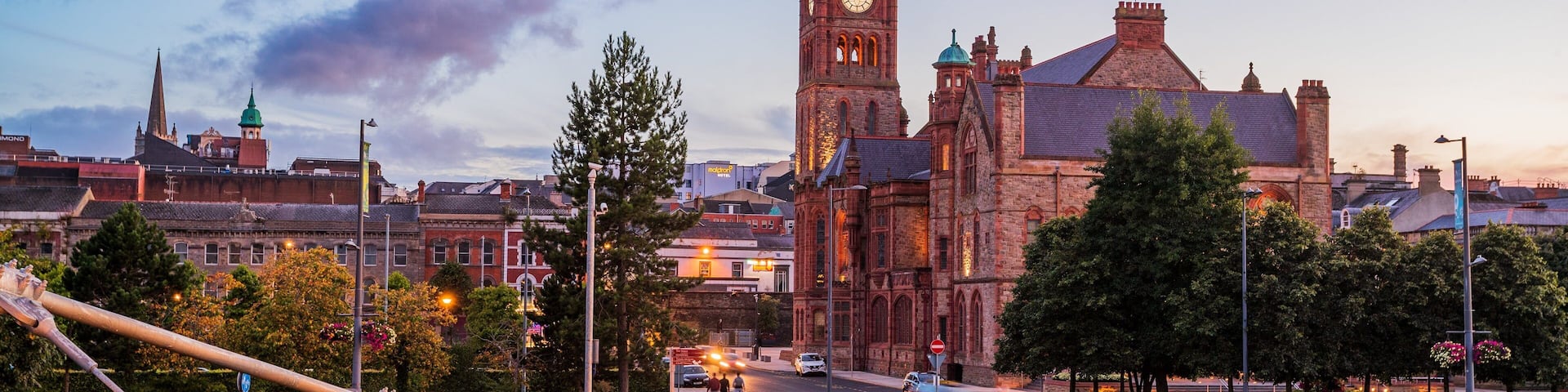 Peace Bridge which includes a sunset, a bridge and heritage architecture