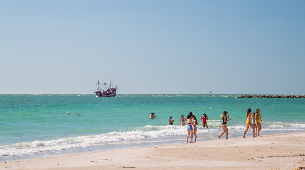 Sand Key Park which includes general coastal views and a beach as well as a small group of people