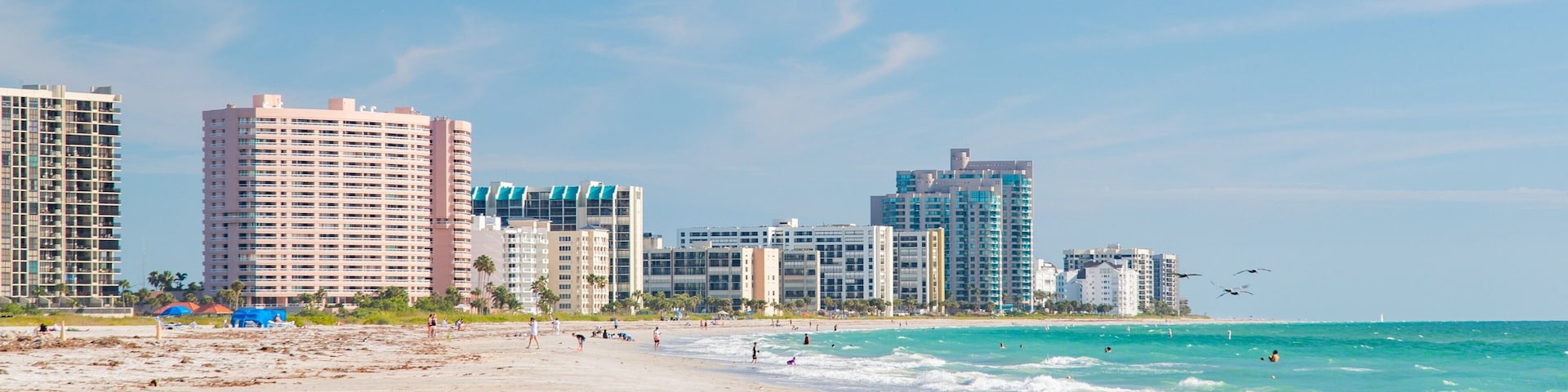Sand Key Park showing general coastal views, a sandy beach and a coastal town