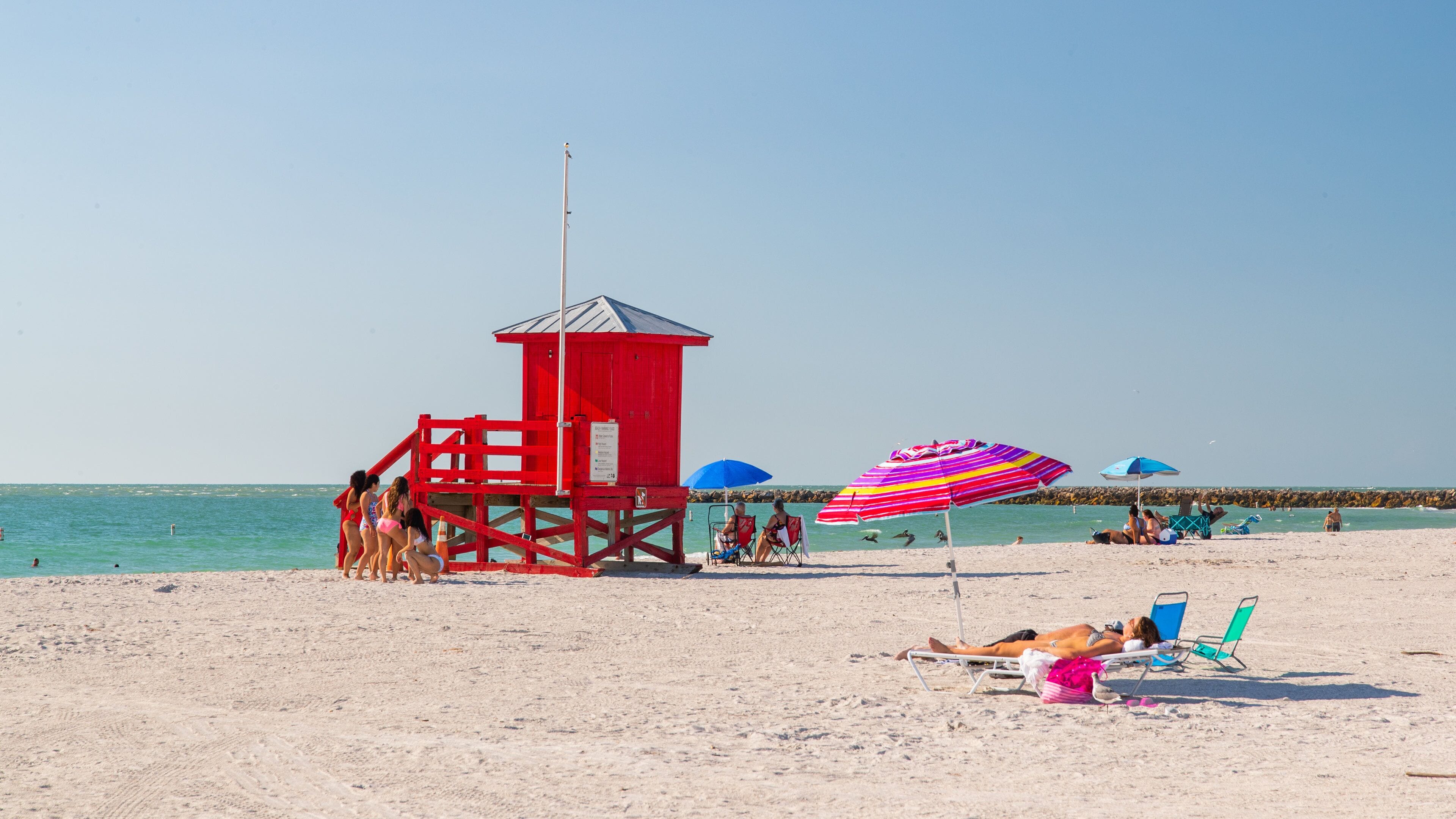 Sand Key Park which includes a sandy beach and general coastal views