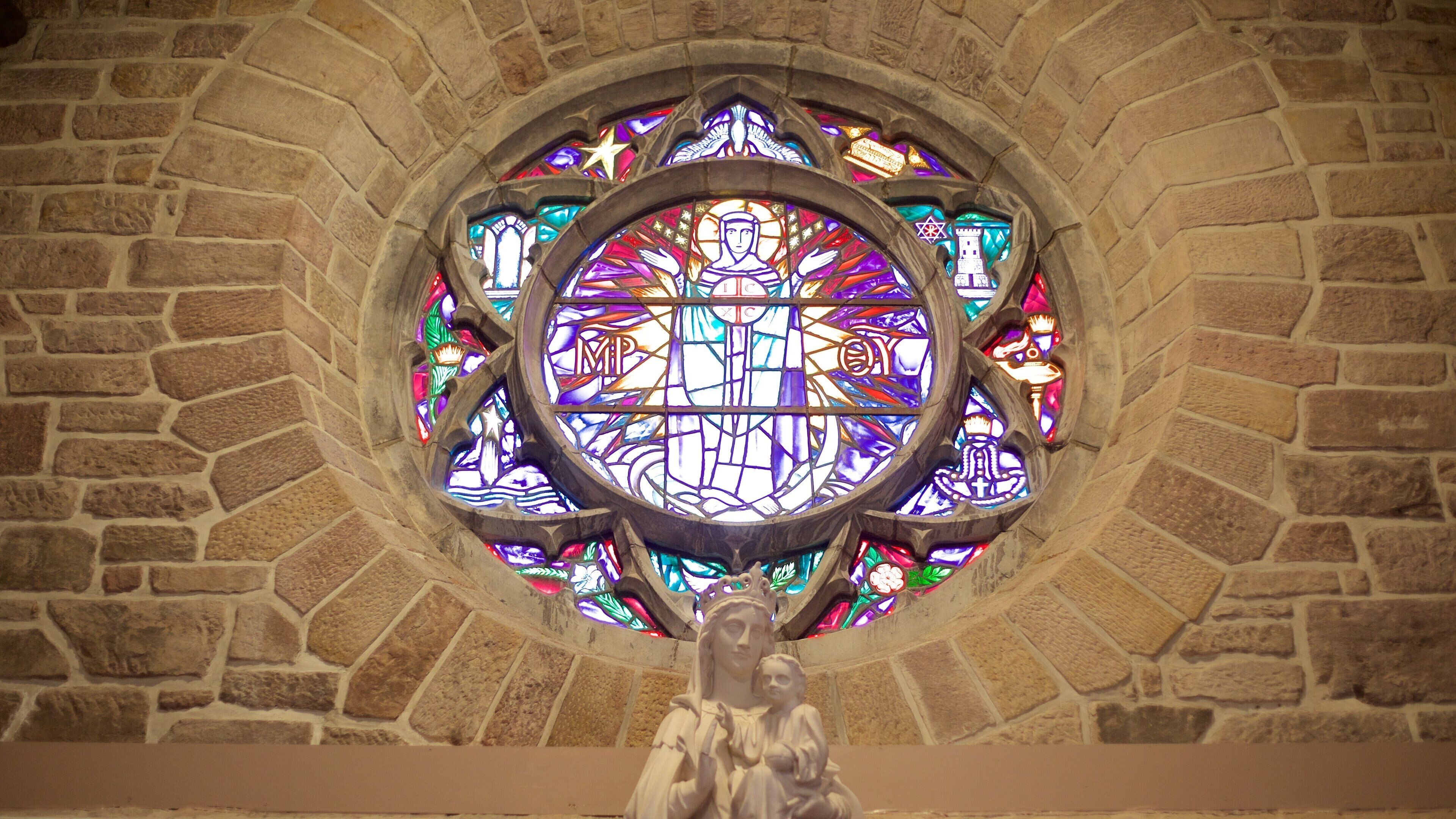 St. John\'s Parish showing heritage elements, religious elements and a statue or sculpture