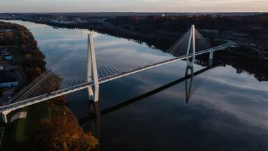 Aerial of Oakley Clark Collins Memorial Bridge at Sunset - Cable-Stayed Suspension - Still Waters of the Ohio River - Russell, Kentucky and Ironton, Ohio