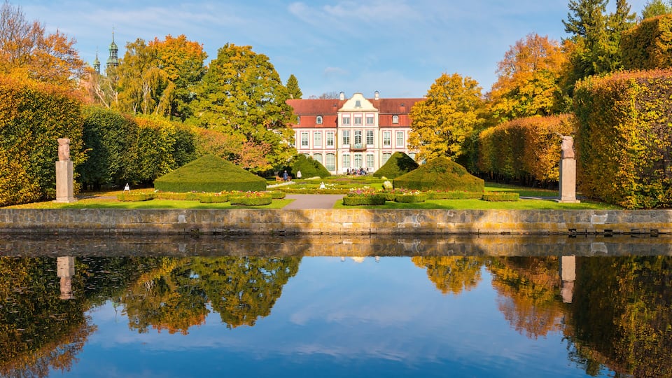Abbots Palace built in the rococo style and located in Oliwa park. Autumn scenery. Gdansk, Poland.