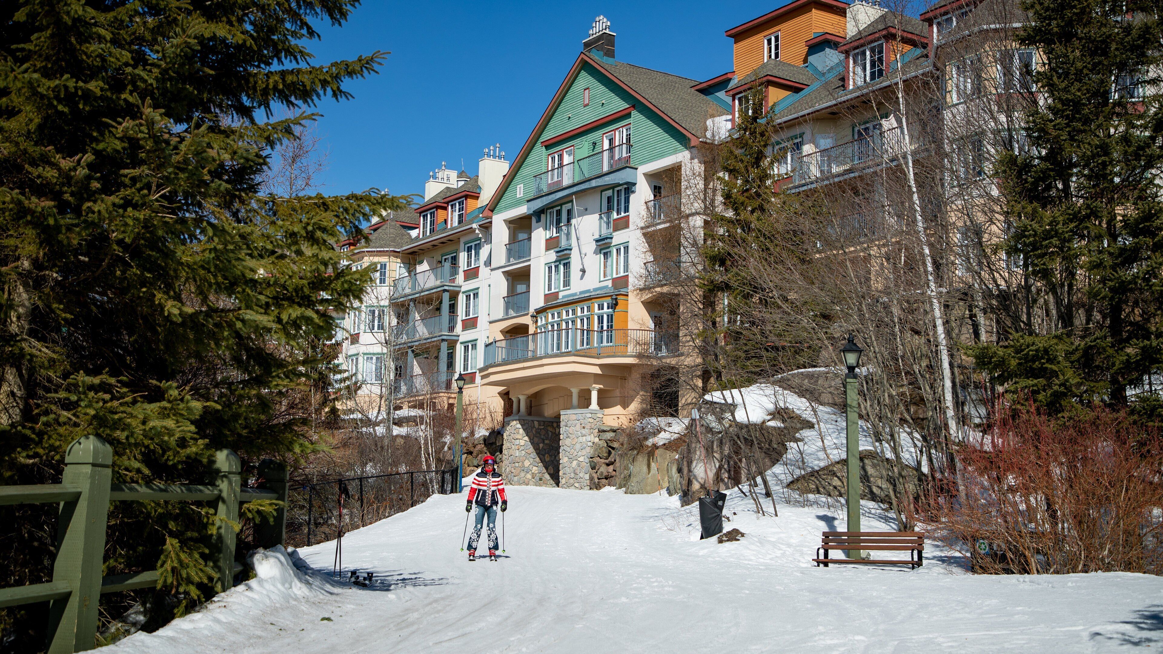 Mont-Tremblant Pedestrian Village showing snow and snow skiing