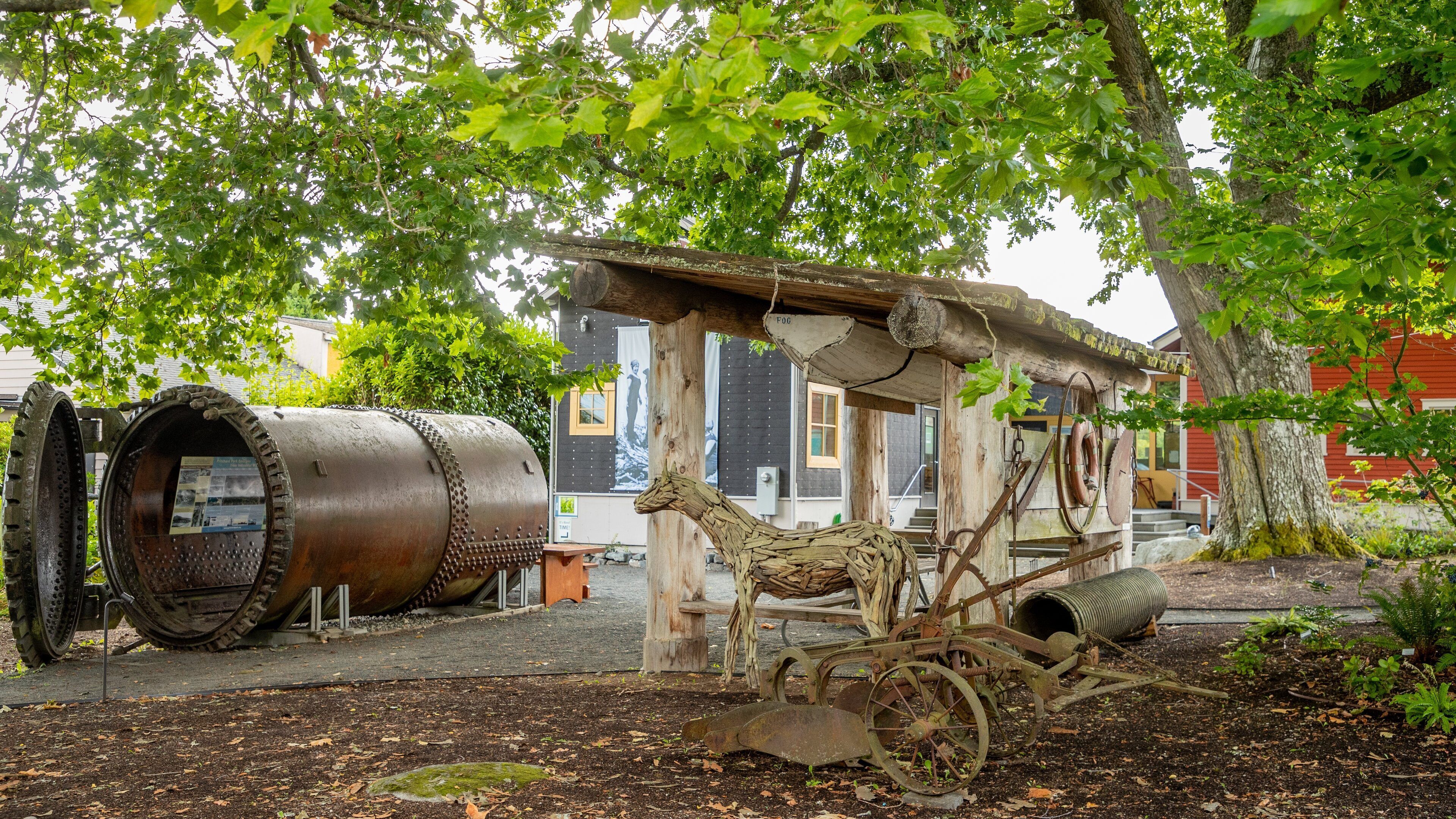 Bainbridge Island Historical Museum showing a park and outdoor art