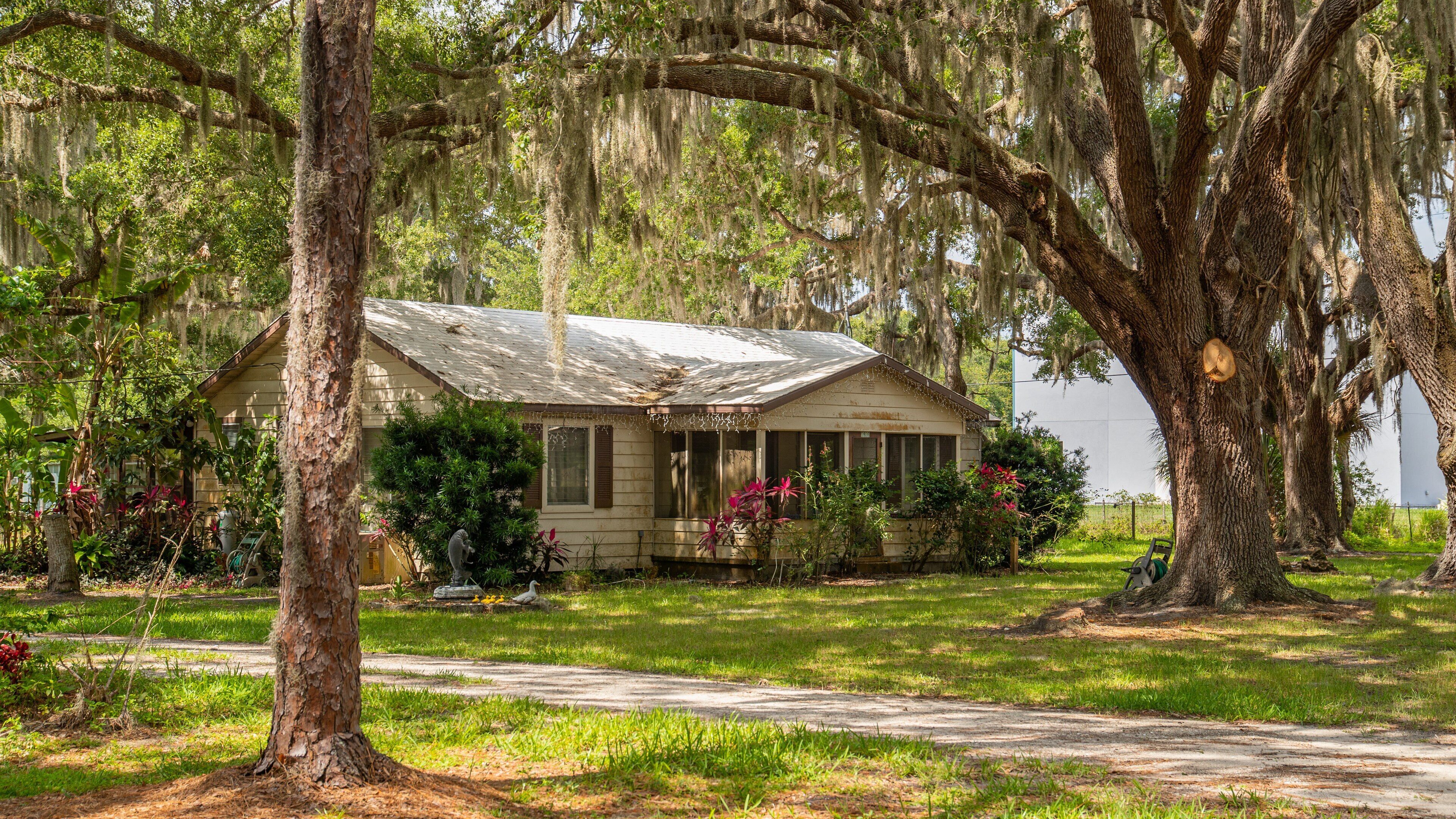 Desoto Lakes which includes a house