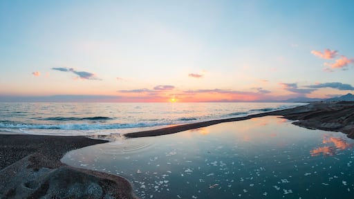 Sunset on sea beach, Cosenza, Italy.
