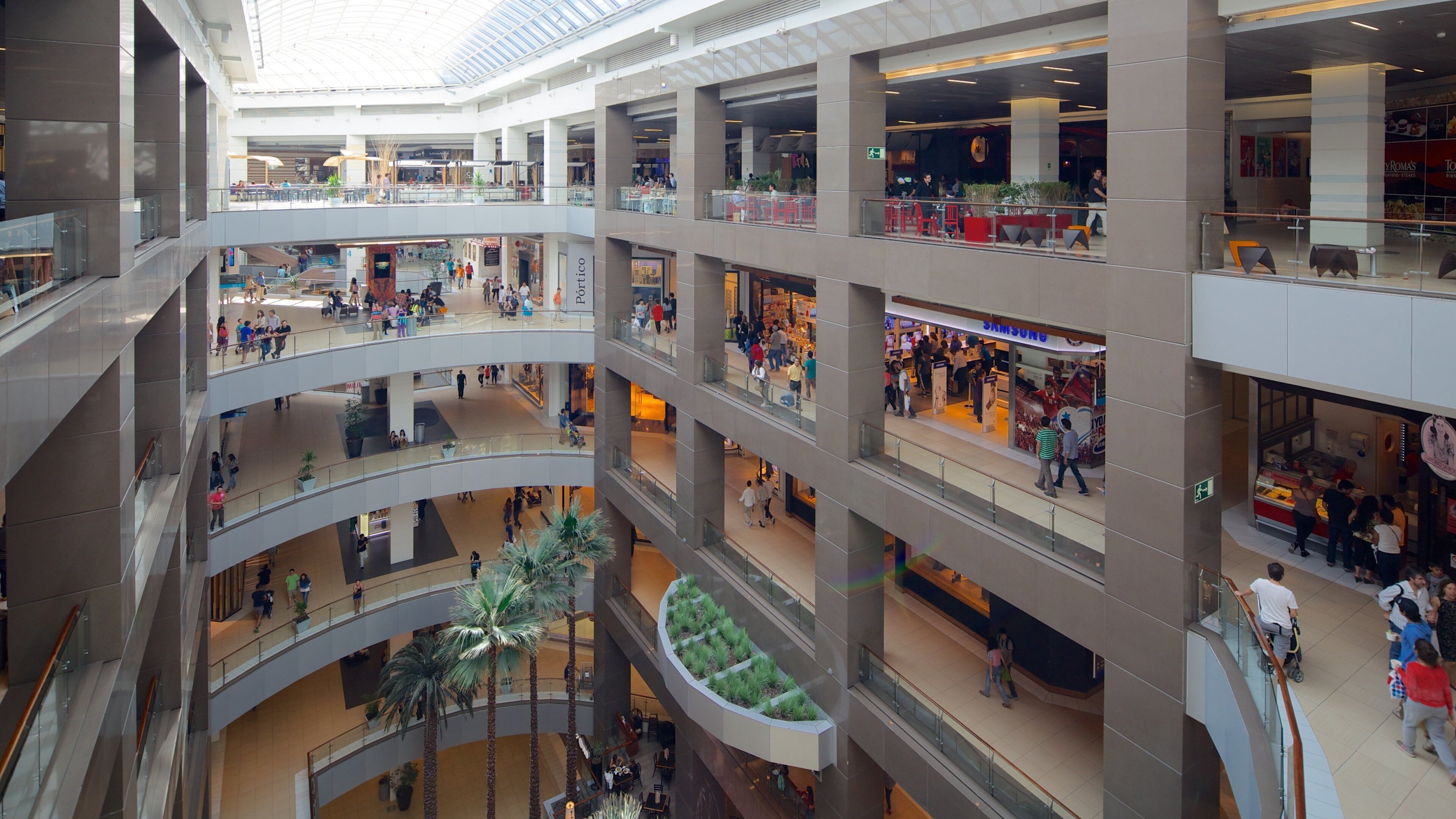 Costanera Center showing shopping and interior views as well as a large group of people
