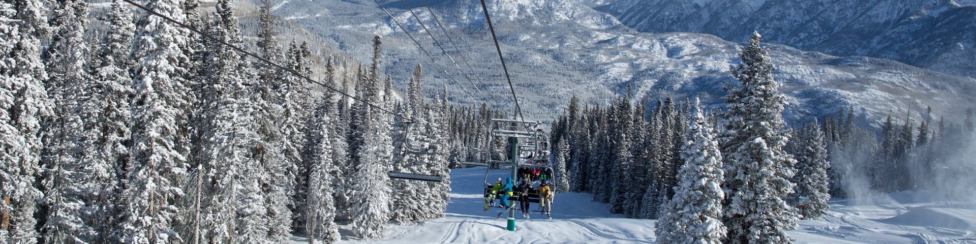 Purgatory Ski Area showing mountains, snow and a gondola