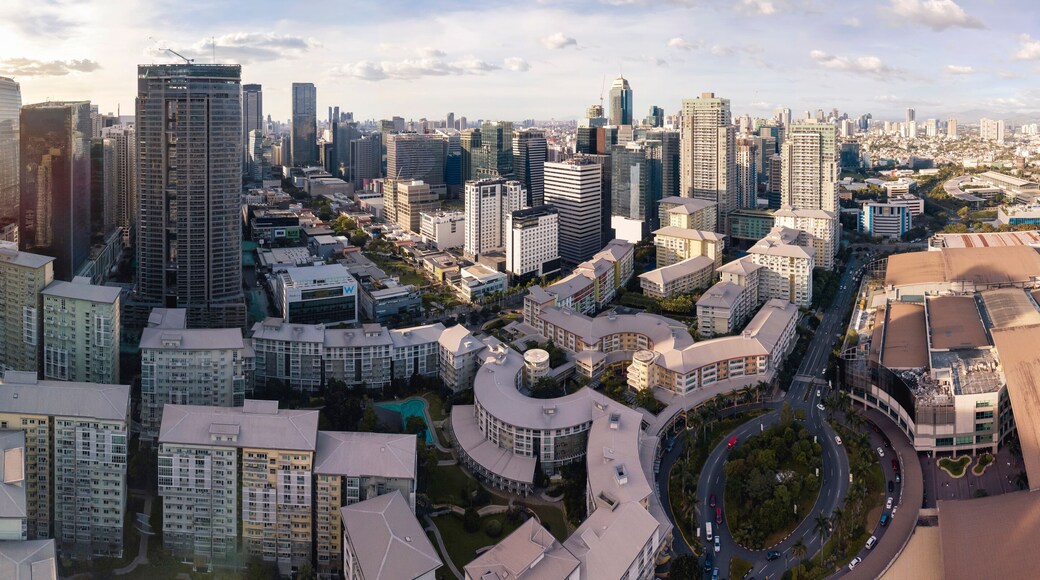 Taguig, Metro Manila, Philippines - Panoramic aerial of Bonifacio Global City (BGC) skyline, Bonifacio High Street, Serendra and Market! Market! in the center of the CBD.