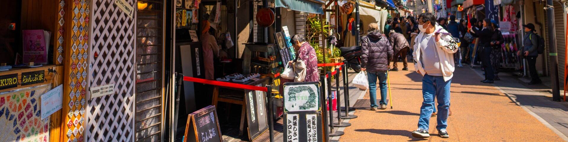 Taito showing street scenes as well as an individual male