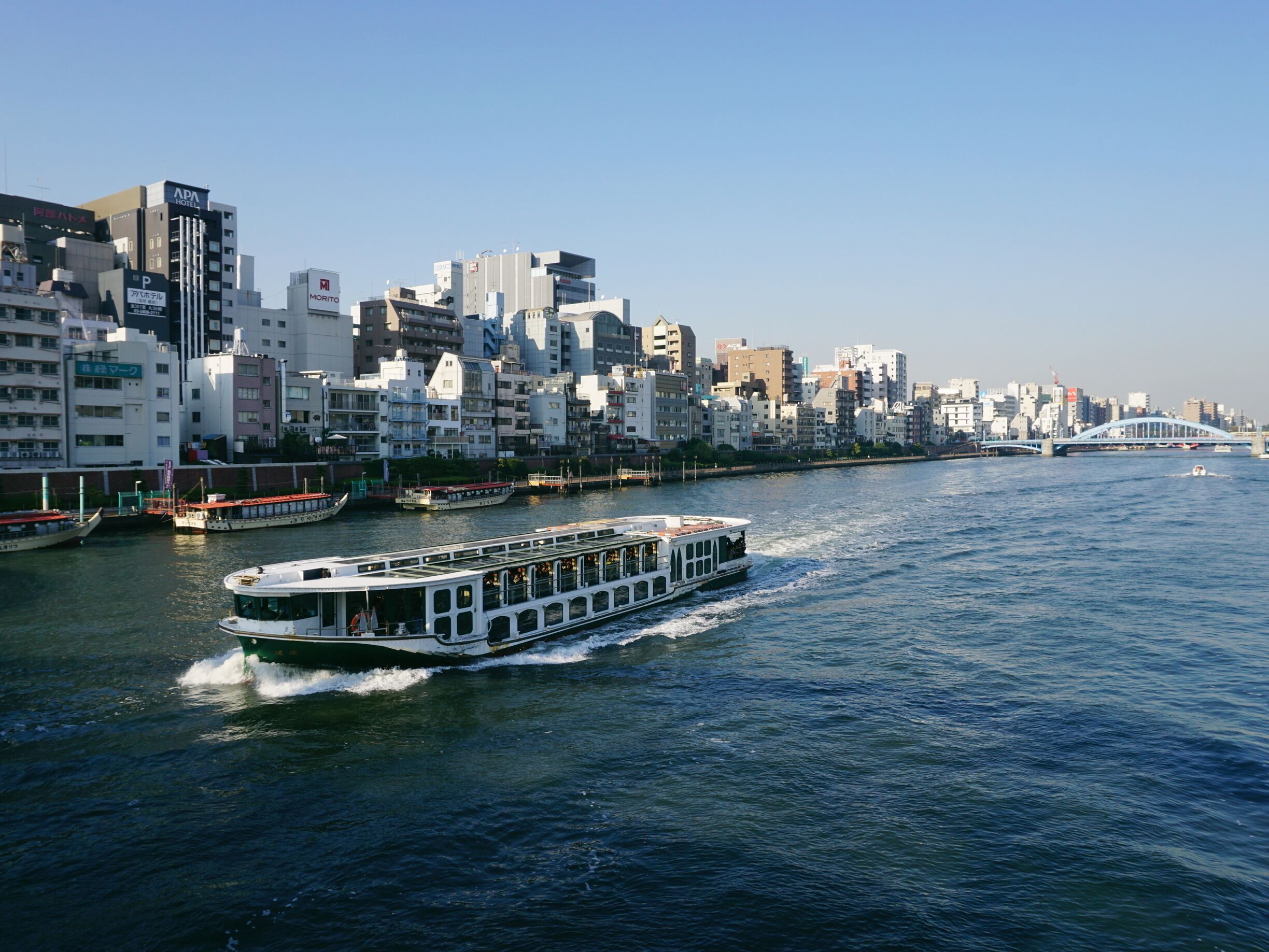 One of the perks of being on the east side of Tokyo is Sumida river, a large river that runs over 25km into Tokyo Bay.

There are a number of river cruises that take you from the Asakusa area to Odaiba. The boat rides are under 1,500yen and in addition, if you decide to get off at the famous Hamarikyu Gardens, the boat ticket covers the entrance fee.

http://www.suijobus.co.jp/en/cruise/