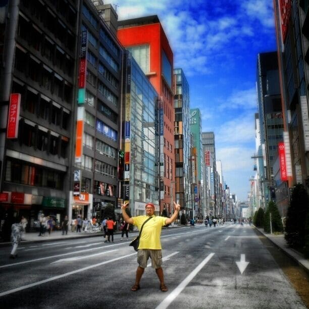 Visiting Ginza is like a trip to Rodeo Drive in Los Angeles. The shopping street is packed with exclusive shops and on weekends the Street is closed for vehicles enabling shoppers to roam freely. 
Here you'll also find the 9 story high Yamaha building and store for musical instruments and music, recorded and sheet music. The interior is impressive and if you head to the hall with concert pianos you are likely to be able to enjoy a piece or two preformed by skilled professional and amateur pianists. 
And yeah it's me posing in photo, who else? ;)